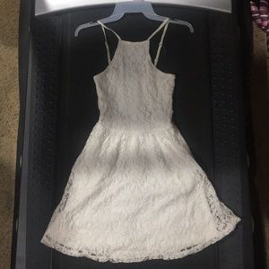 Junior size lacy party dress with pockets